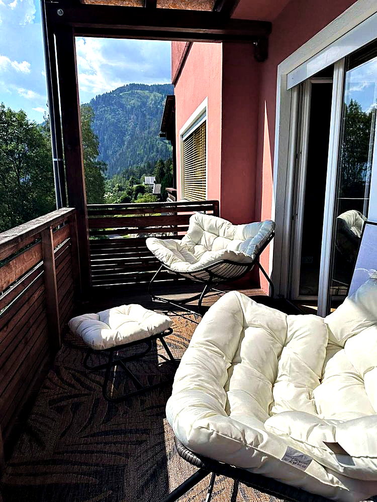 Overdekt terras op het zuidwesten met zitmeubels, appartement SONNWEIT